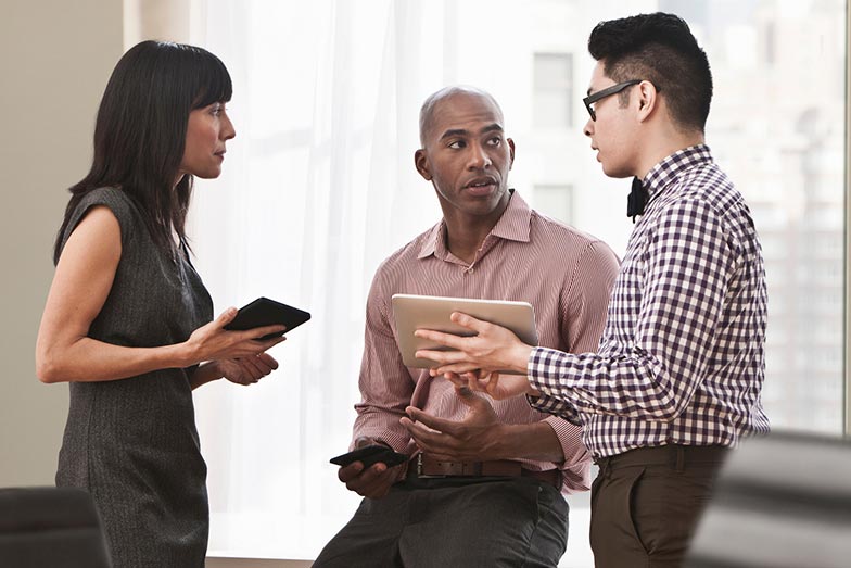 conversation at work with three persons