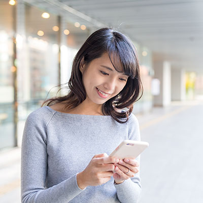 woman looking at phone