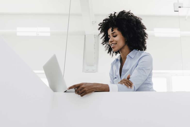 woman looking thoughtful in office