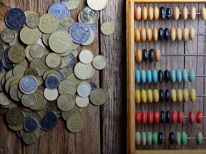 Coins and abacus