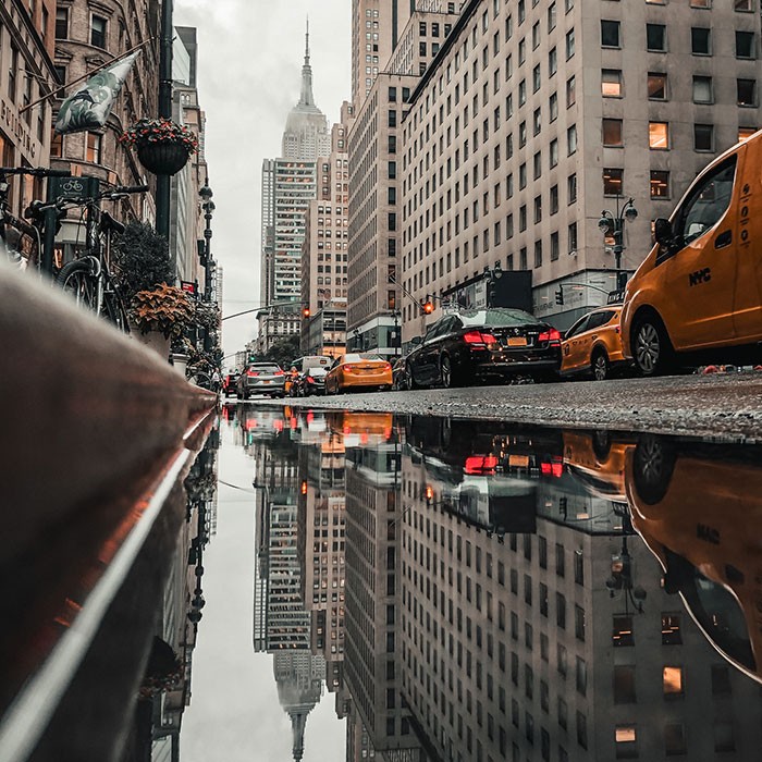 REFLECTION OF BUILDINGS ON CANAL