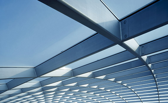 Image of the roof of a glass building that is on the cover of the report. 