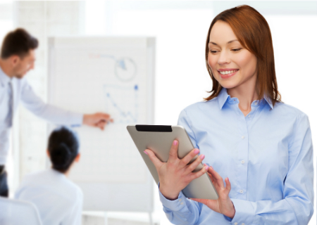 women holding tablet device