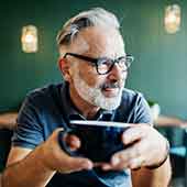 Man drinking coffee in a coffee shop