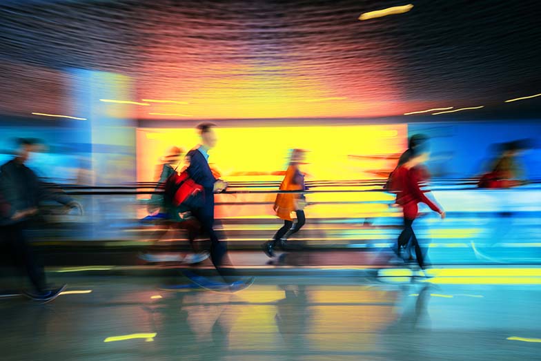 people walking on the street going to work