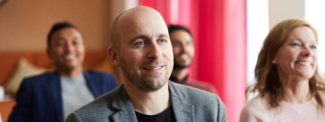 Person smiling in a business situation