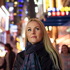 Peron looking skywards in urban setting