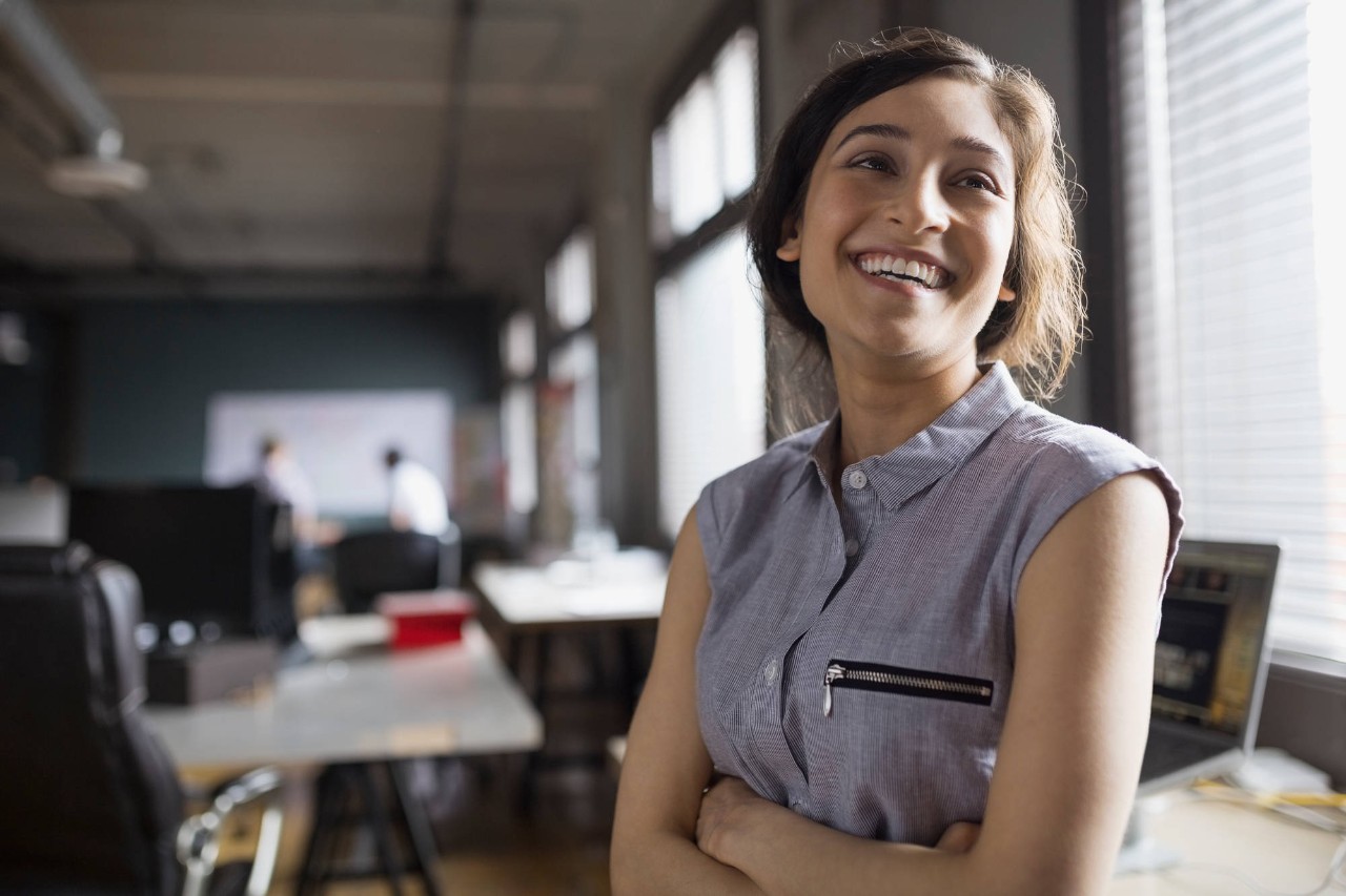 Smiling businesswoman in office