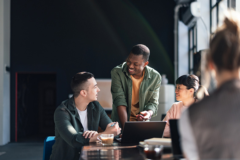 Two men and woman in discussion