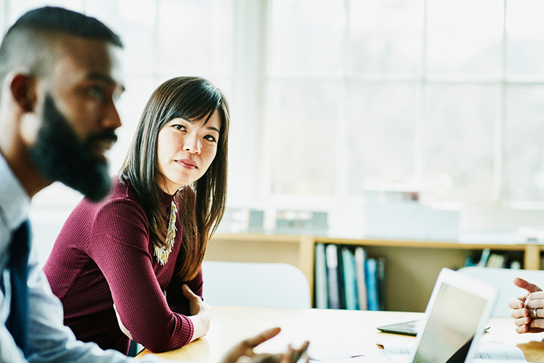 Two people in office