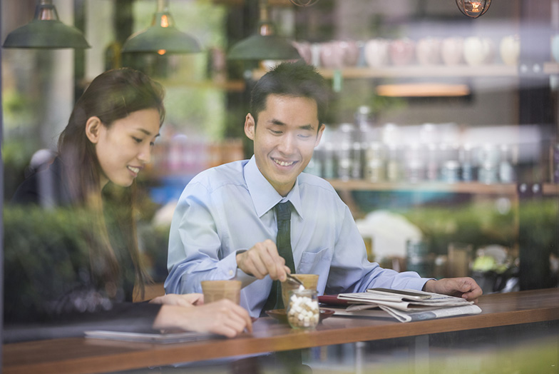 People drinking coffee in a coffee shop
