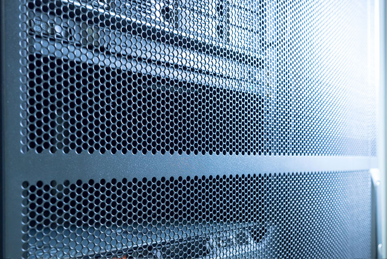 Machine seen through metal grid