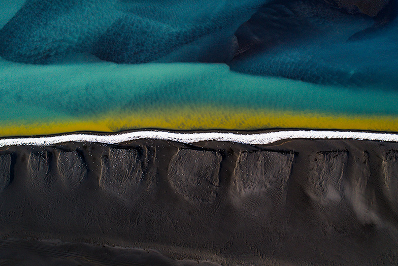 Aerial image of  a beach and a river