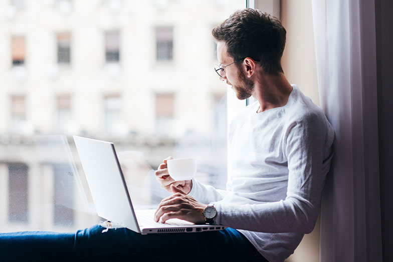person looking at laptop