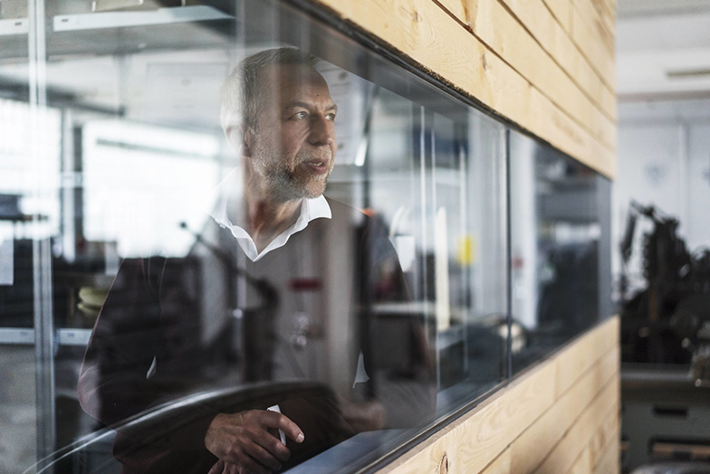 A person looking out of a window