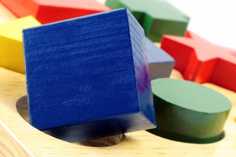 colourful blocks in various shapes representing neurodiversity