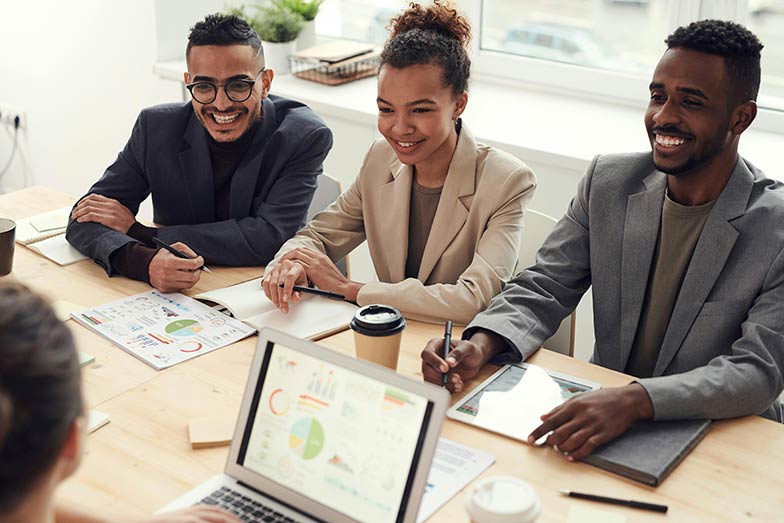 meeting at table with three persons