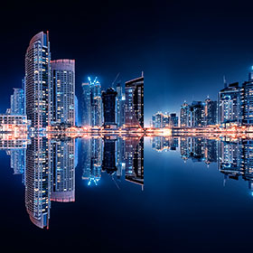 Cityscape reflected in water