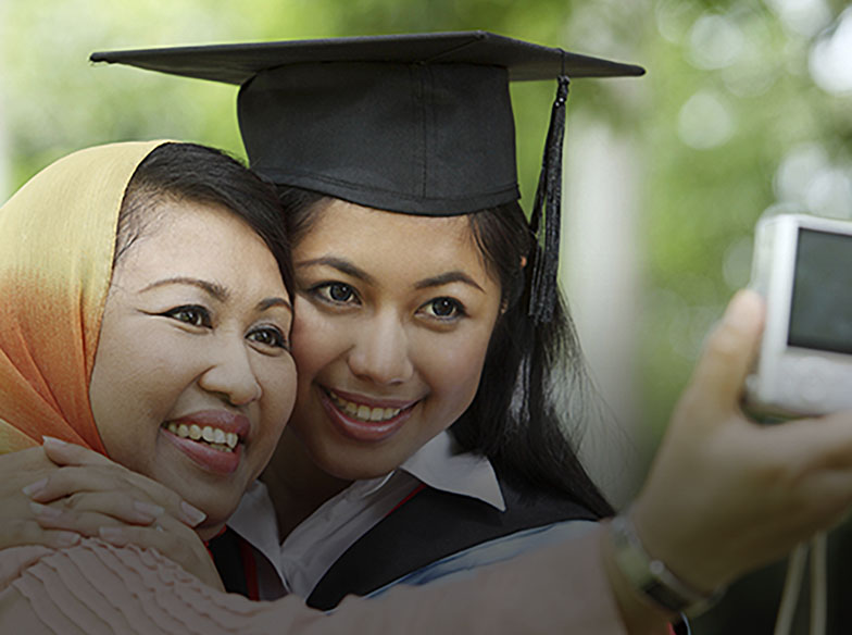 two people celebrating graduation