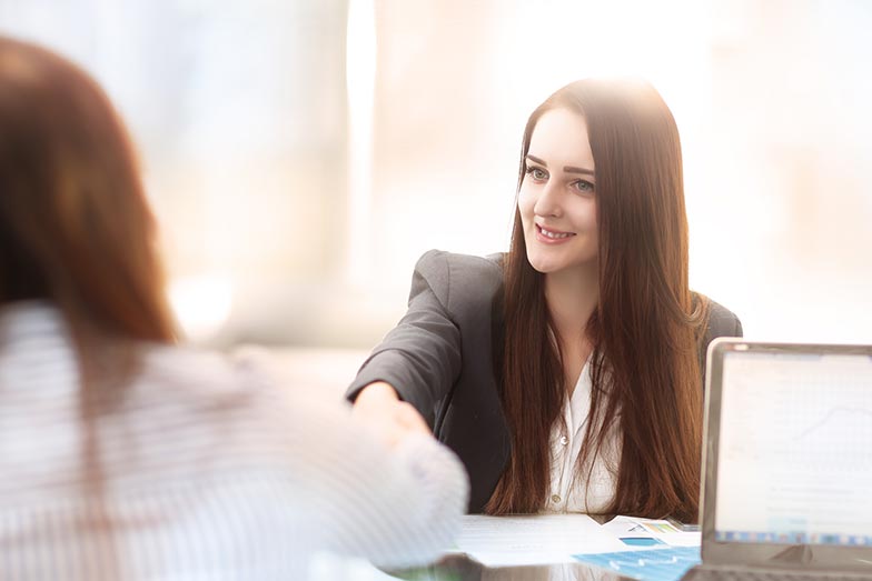 handshake and smile introduction in meeting